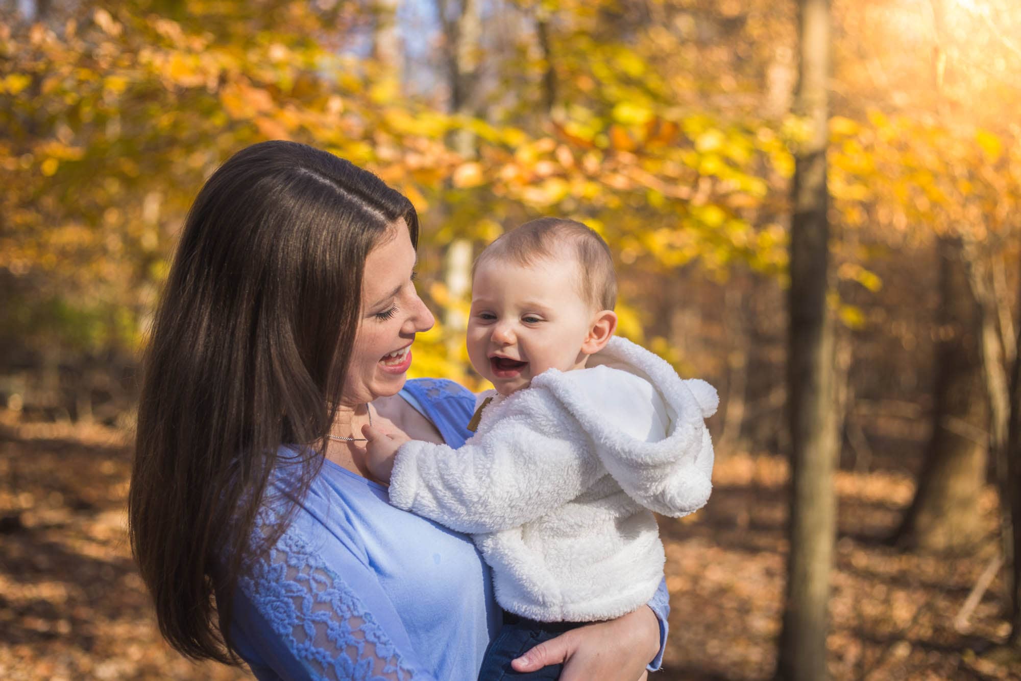 Mother and daughter in the woods