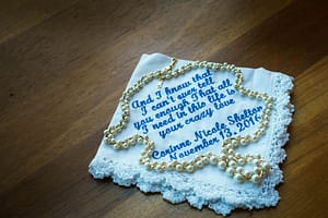 Sentimental napkin with pearls.