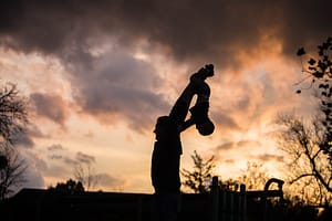Father holding his son